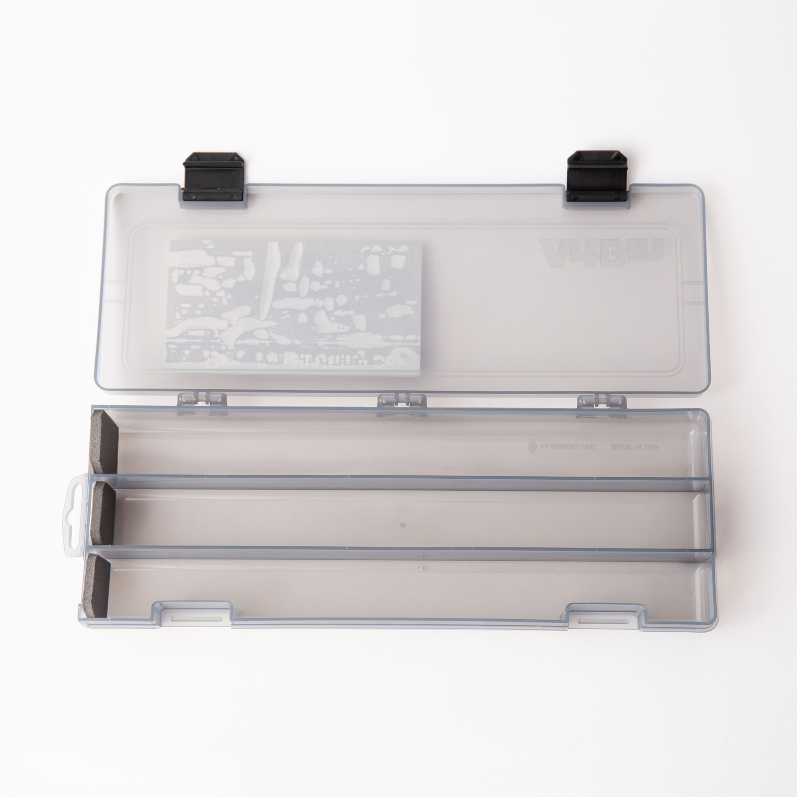 Clear pencil/utility box with 3 compartments and foam inserts on a white background
