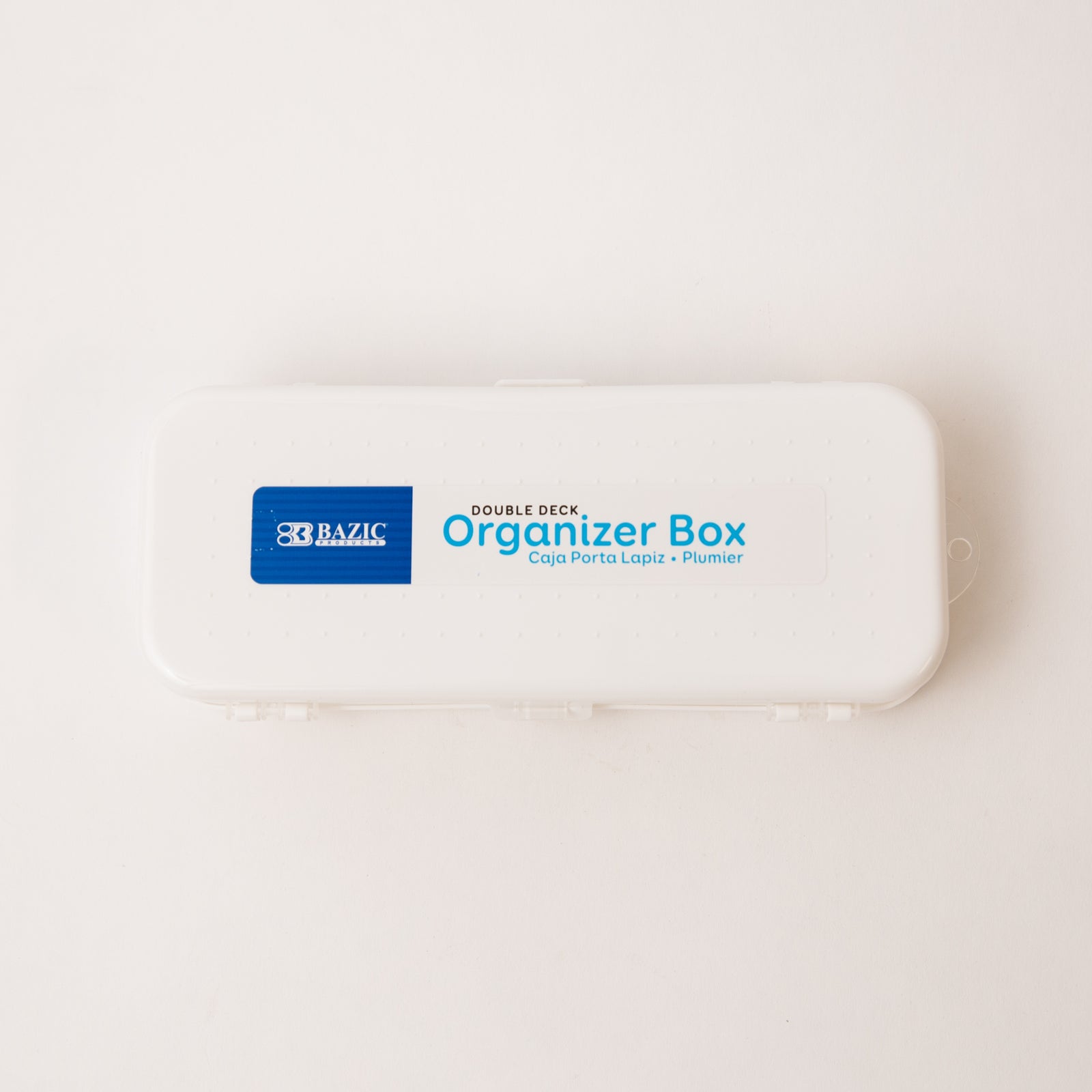 White organizer box with BAZIC branding on a light beige background