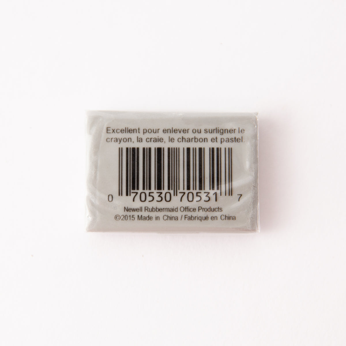 Small rectangular eraser with a barcode and text on a white background