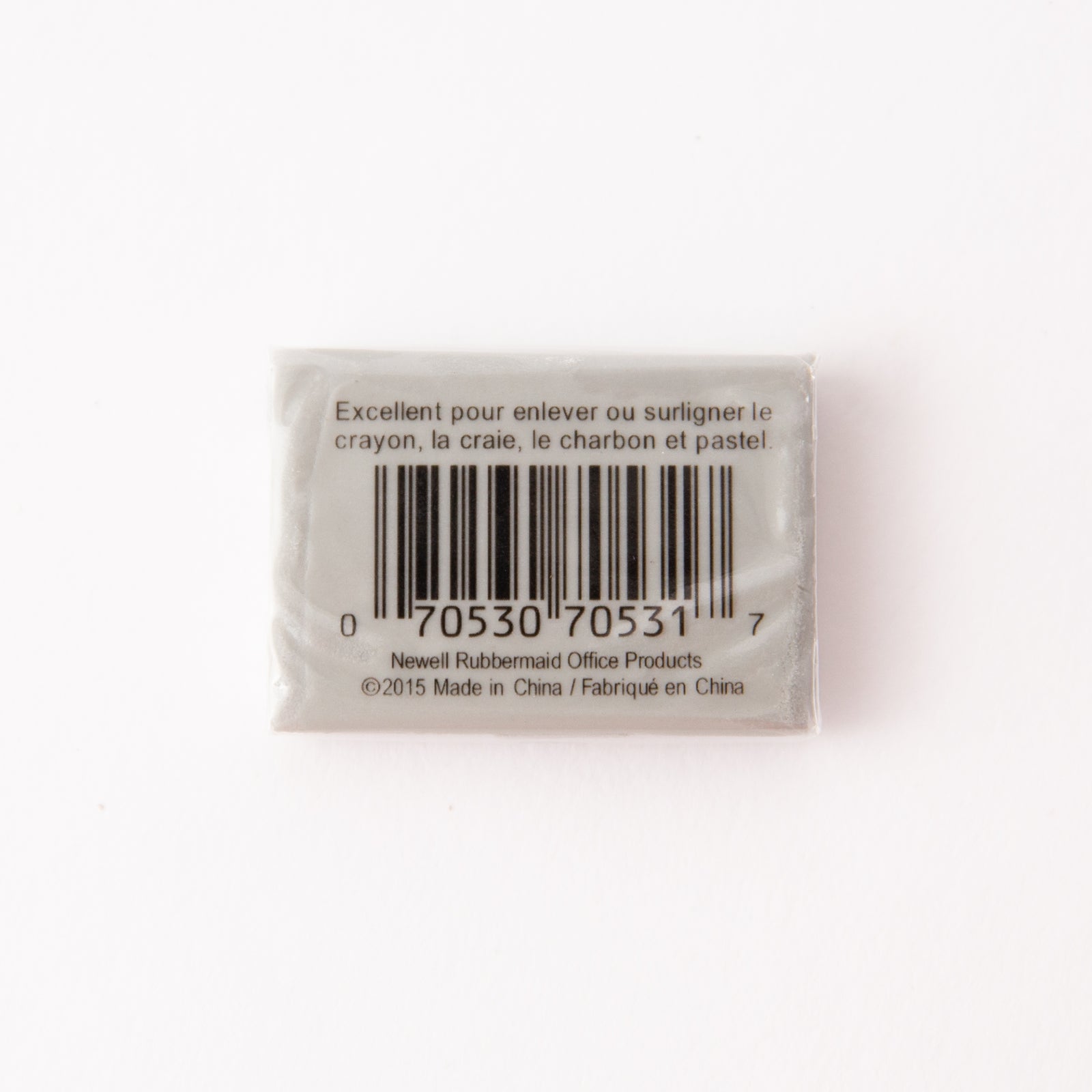 Small rectangular eraser with a barcode and text on a white background
